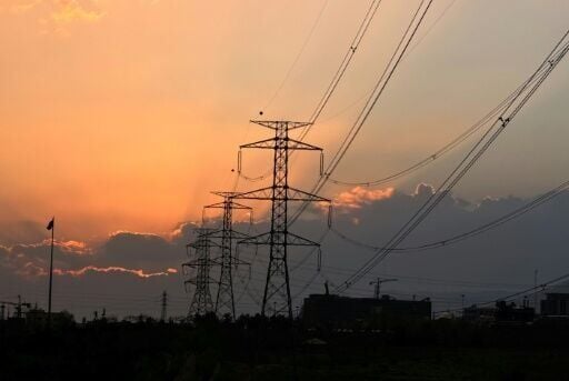 Power transmission towers at sunset in Tehran. US President Donald Trump said Tehran had 48 hours left to cut a deal or face "all Hell"