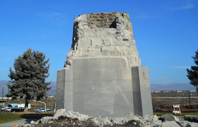 Monument base removal underway