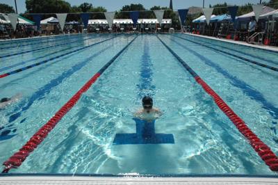 Finn Blakeslee of the Hood River summer swim team competes at the Ted Walker meet in The Dalles June 13. Blakeslee qualifed for the age 12U.