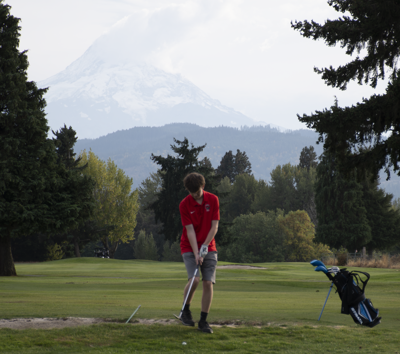 Liam Hausmann sets up a chip at Indian Creek Golf Course on Oct. 9                Zach Thummel photo