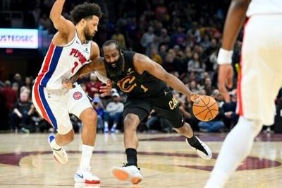 Cleveland's James Harden drives past Cade Cunningham in the Pistons upset of Detroit