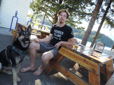 Three people, and a dog, survive capsizing in Columbia near Wyeth