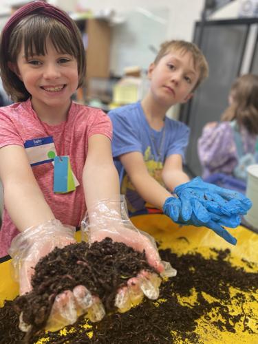 Students learn about vermiculture and composting from instructor Kate Garrison.