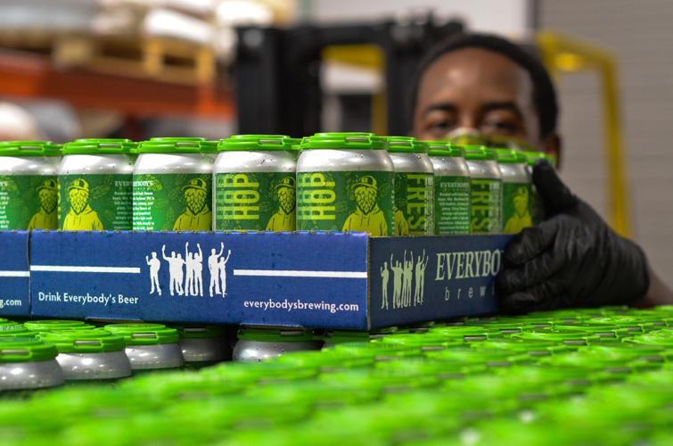 09-30 the ale lit everybodys Brew Crew stacks pallet of Head Stash 6-packs.jpg