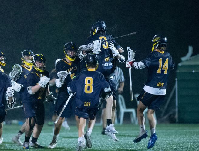 Sophomore Michael Frost (#3) is hoisted up by his team after scoring the game winning goal in sudden death overtime against OES..jpg