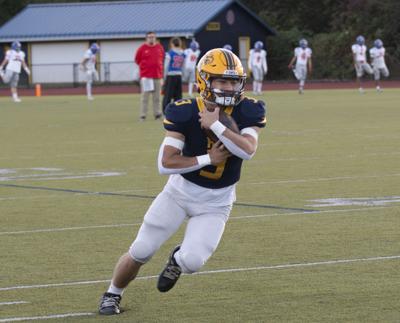Bam Layna tucks the ball during warmups earlier this year    Zach Thummel photo