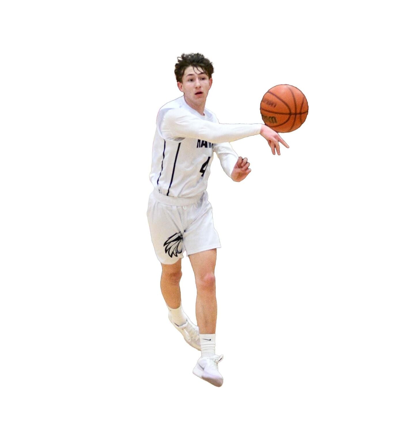 Riverhawk senior Hudson Case (4) passes the ball up the floor this winter.