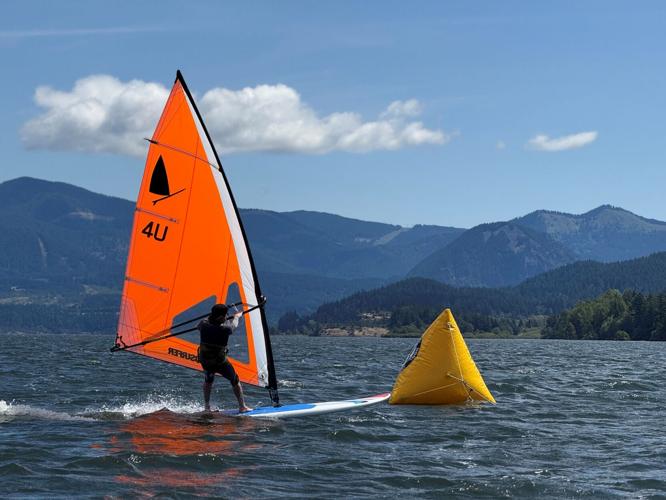 Owsin Chilton (from the Bay Area) Orange sail.jpg