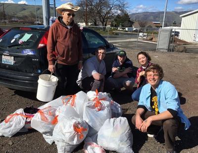 Walking group gathers trash at Kramer Field