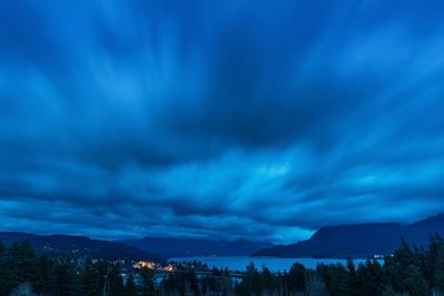 dramatic sky moving over river