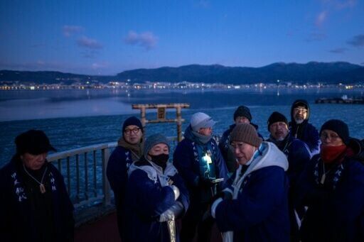 A Japanese priest and his parishioners gather before dawn, hoping climate change hasn't robbed them of a rare communion with the sacred