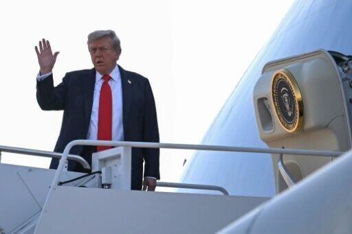 US President Donald Trump waves as he boards Air Force One on August 15, 2025, en route to Anchorage to meet with Russian counterpart Vladimir Putin
