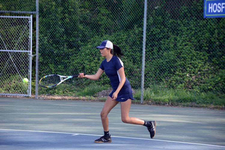 Girls tennis gets first league win
