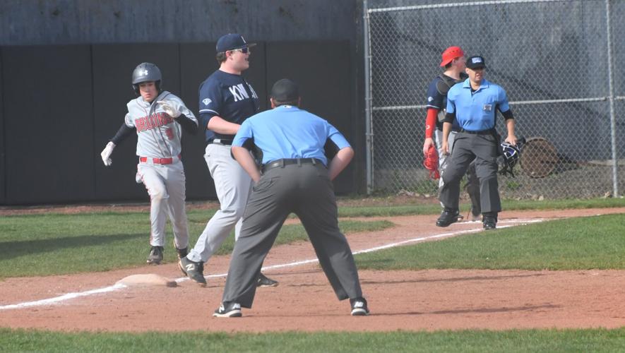 Garrett Kock Freshman safely makes first base against Kings Way 3-22DSC_7471.JPG