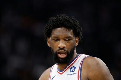 The Philadelphia 76ers say star center Joel Embiid will miss at least three games with an oblique strain
