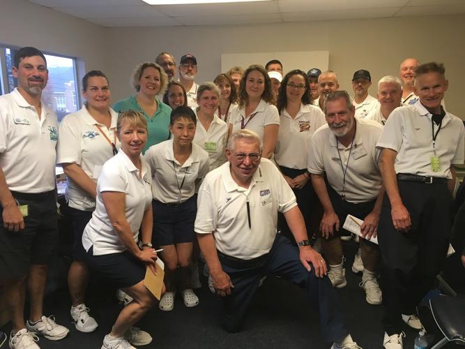 Swimmers post big improvements at home meet