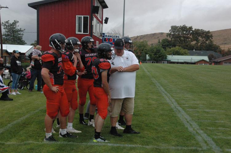 Sherman coach Kyle Blagg (white shirt).jpg