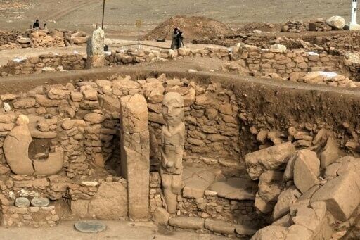 A pillar and a human statue are among the artifacts offering clues about Neolithic life