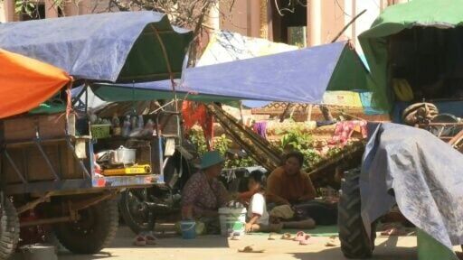 Cambodians take shelter in a Buddhist temple amid renewed clashes with Thailand