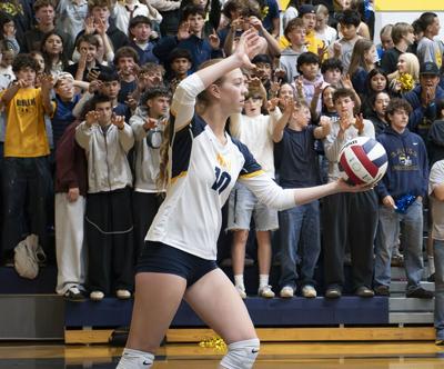 Emily Doss (10) serves the ball for Hood River Valley against Canby on Oct. 2.