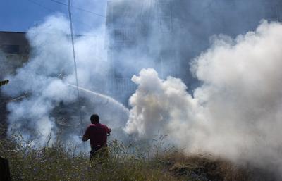House, brush fire burn Friday in TD