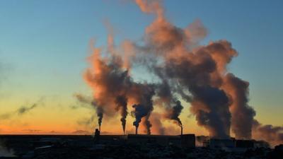 Steam Rises from a Geothermal Power Plant