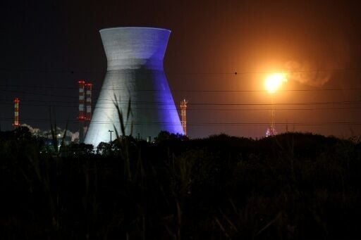 Excess gas is burned at an oil refinery in Israel's northern city of Haifa late on March 19, 2026