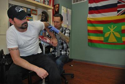 Bingen tattoo artist is top dog at convention