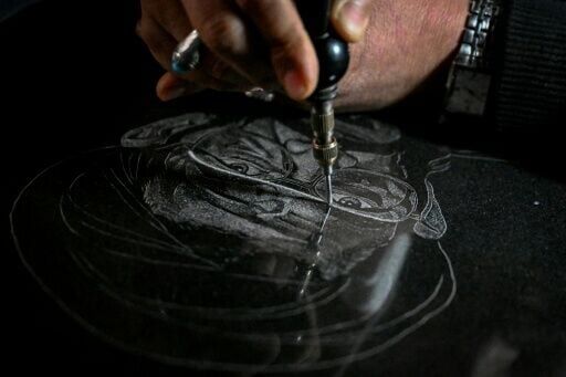 Artist Sadiq Poya is behind many of the engravings in the cemetery in Quetta, southwest Pakistan