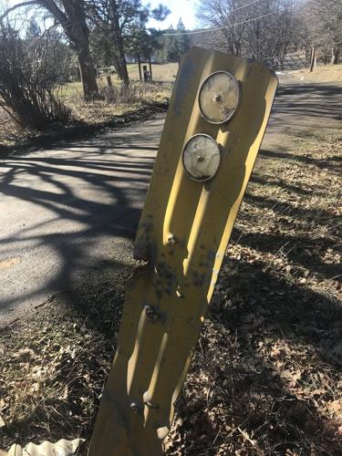 above mosier, bent yellow sign.JPG