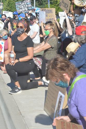 WEB hr monday vigil, kneeling to honor George Lloyd.JPG