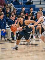 Eagles open NWOC season with win over Canby
