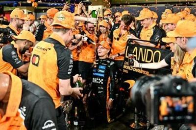 Lando Norris (C) won the title by two points ahead of Max Verstappen