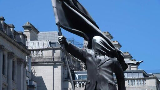 Banksy statue of man blinded by flag pops up in central London