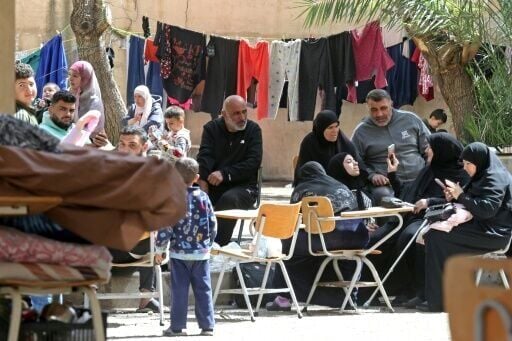 Families displaced by the conflict in southern Lebanon, in the coastal city of Sidon