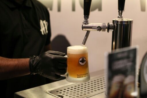 Setting them up: a bartender at the A12 in Riyadh pulls pints for customers