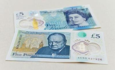 Churchill appears on the current £5 note along with an image of parliament