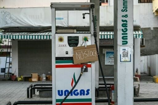 A "no stock" sign is displayed on a pump at a petrol station in Hyderabad, India on March 25, 2026.