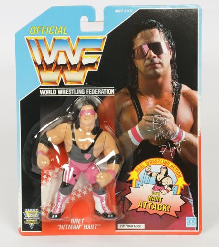 WWF wrestling figures from the 1990s fetch thousands of pounds at auction