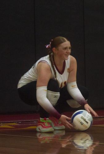 Caitlynn Gatton (11) gets ready to serve the ball for The Dalles earlier this year  Martin Gibson photo