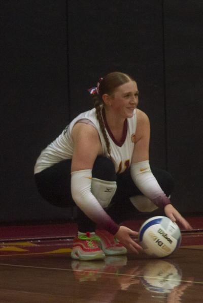 Caitlynn Gatton (11) gets ready to serve the ball for The Dalles earlier this year  Martin Gibson photo