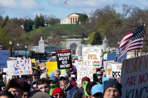 Demonstrators walk from Virginia into the US capital Washington during a 'No Kings' national day of protest against US President Donald Trump and his policies