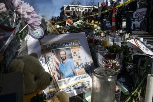 An image of Alex Pretti is seen at a makeshift memorial in the area where Alex Pretti was shot dead by federal immigration agents in Minneapolis, Minnesota, on January 26, 2026