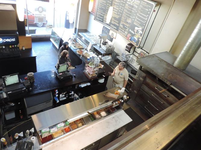 Oven-baked anniversary: Andrew’s Pizza shapes up a 25th-year celebration