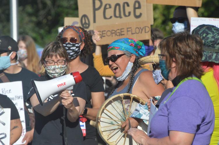 WEB hr monday vigil, lana jack, rev vicky stifter with megaphone.JPG