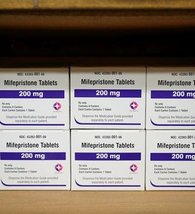Boxes of the drug mifepristone line a shelf at a women's center in Alabama on March 16, 2022.