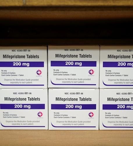 Boxes of the drug mifepristone line a shelf at a women's center in Alabama on March 16, 2022.