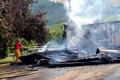 Garage destroyed, home damaged in Pine Grove fire