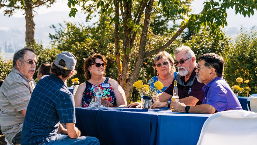 HRV Class of 73 around table.jpg