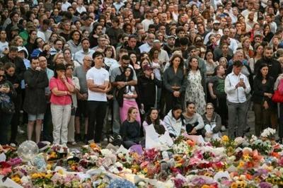 Mourners gather earlier this week in memory of the victims of a mass shooting at Bondi Beach